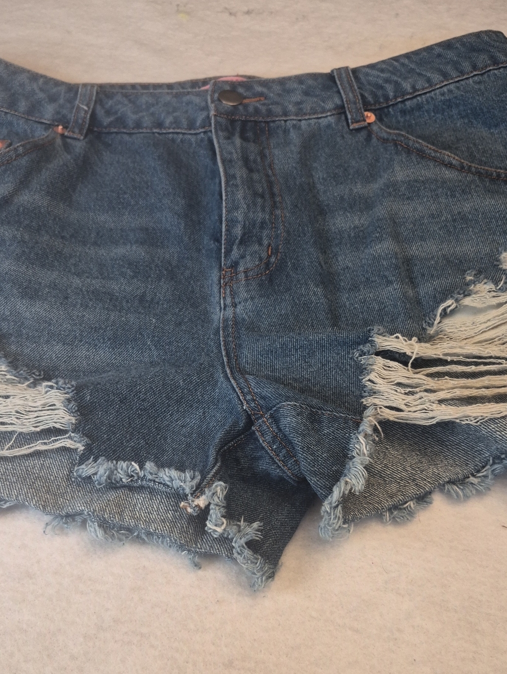 Women’s Blue Distressed Denim Cutoff Shorts